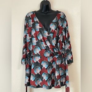 Isabel & Alice, size 1X, ties off to the side in the front or back.